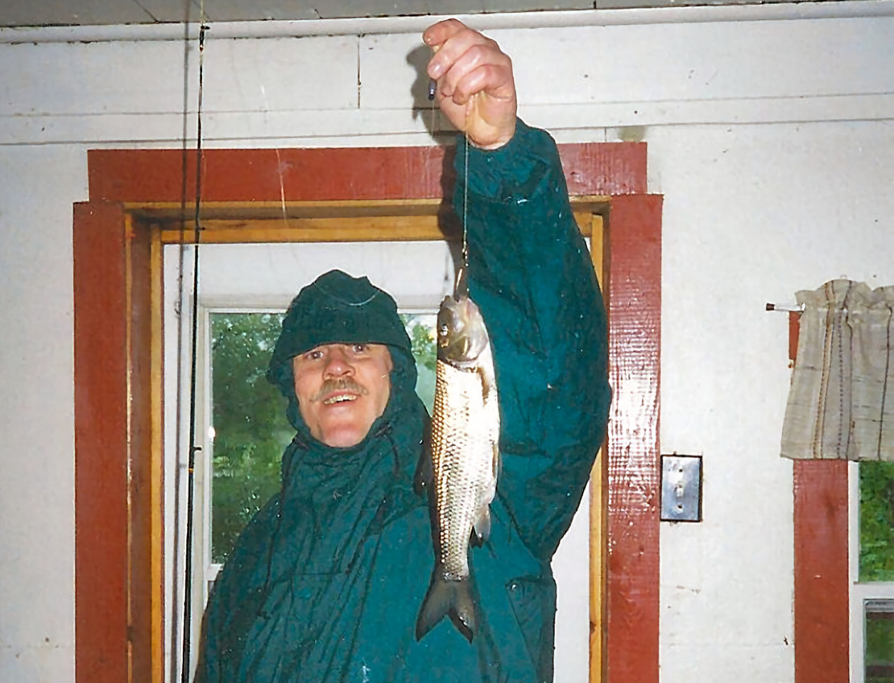 Ron caught this one fishing off the dock in a torrential downpour