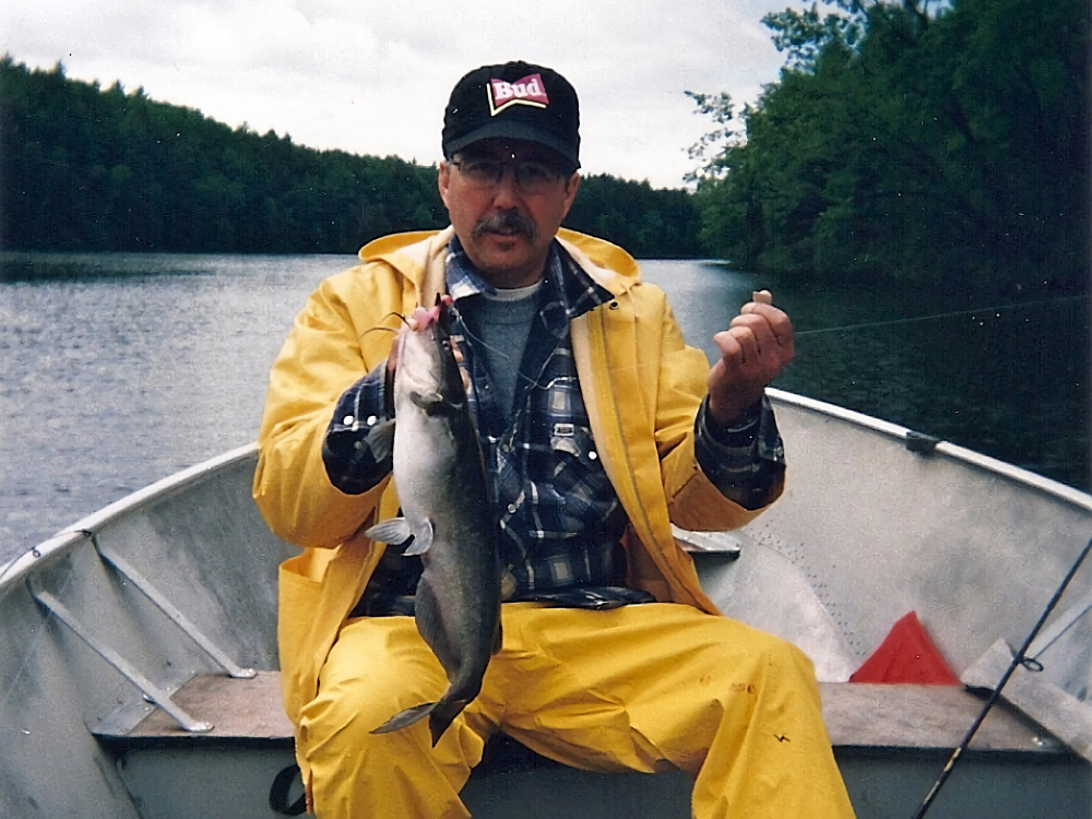 Phil with one of his many channel cats