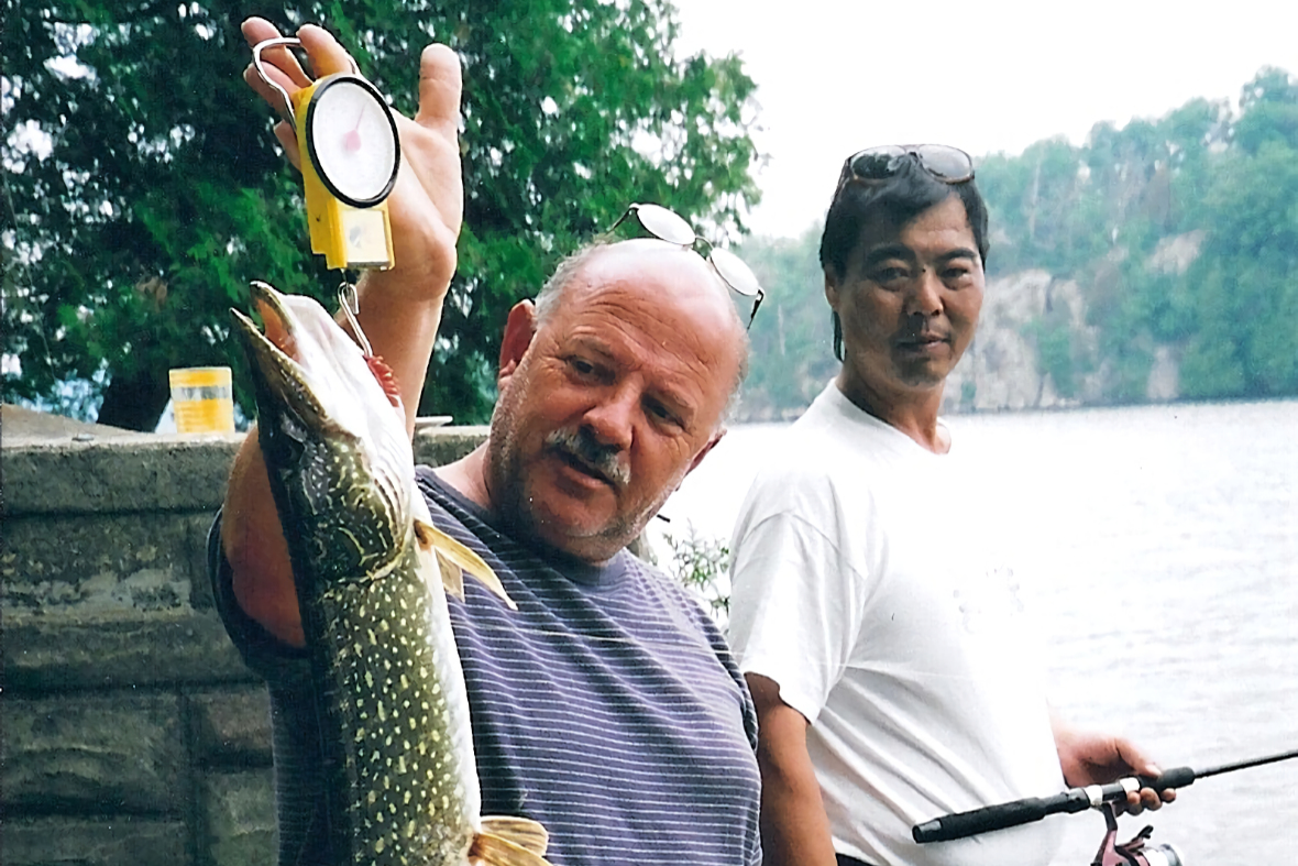 Al Heaney catches a large northern pike off Pike Point